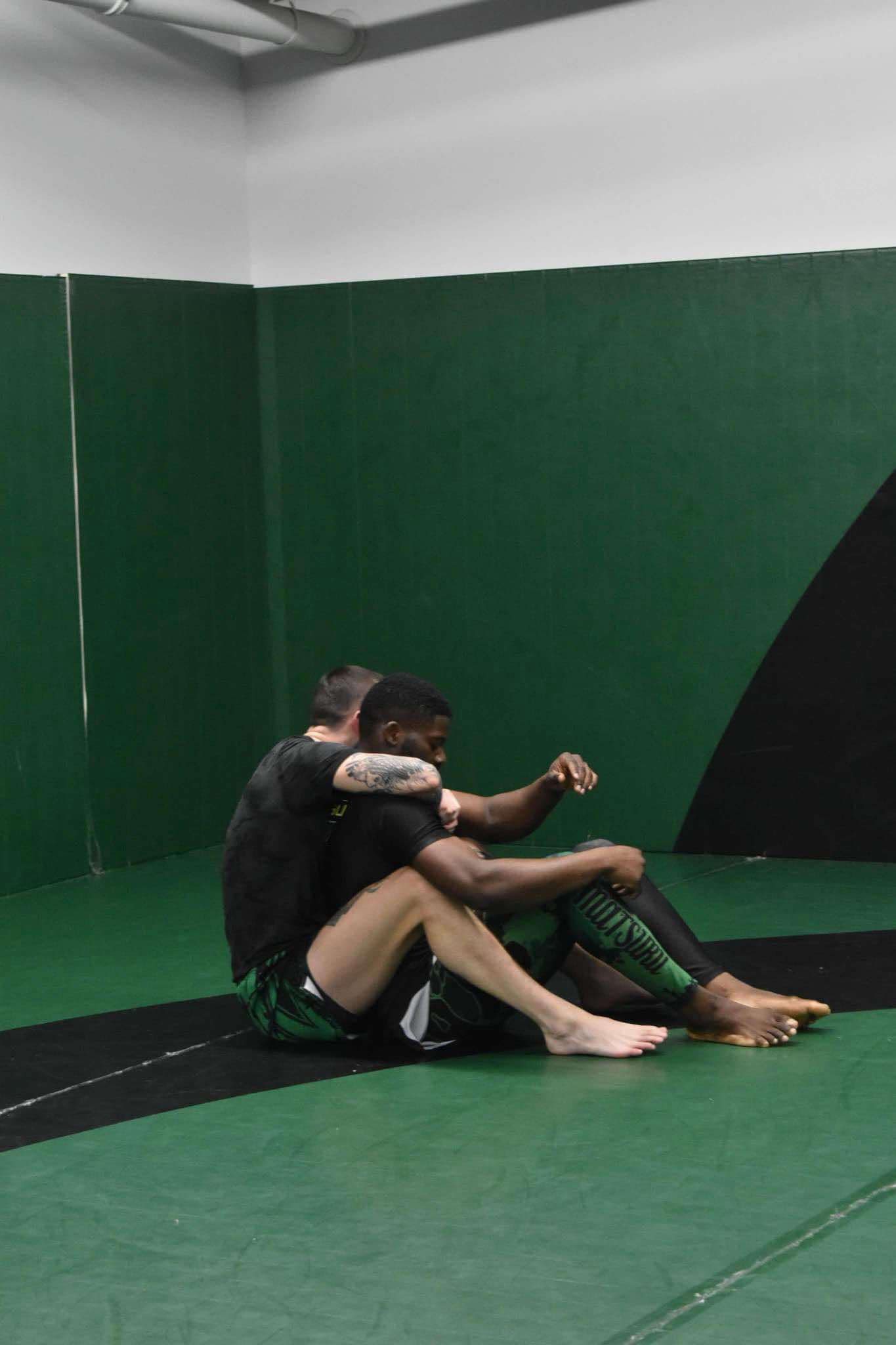 King Combat Sports students grappling on the mat