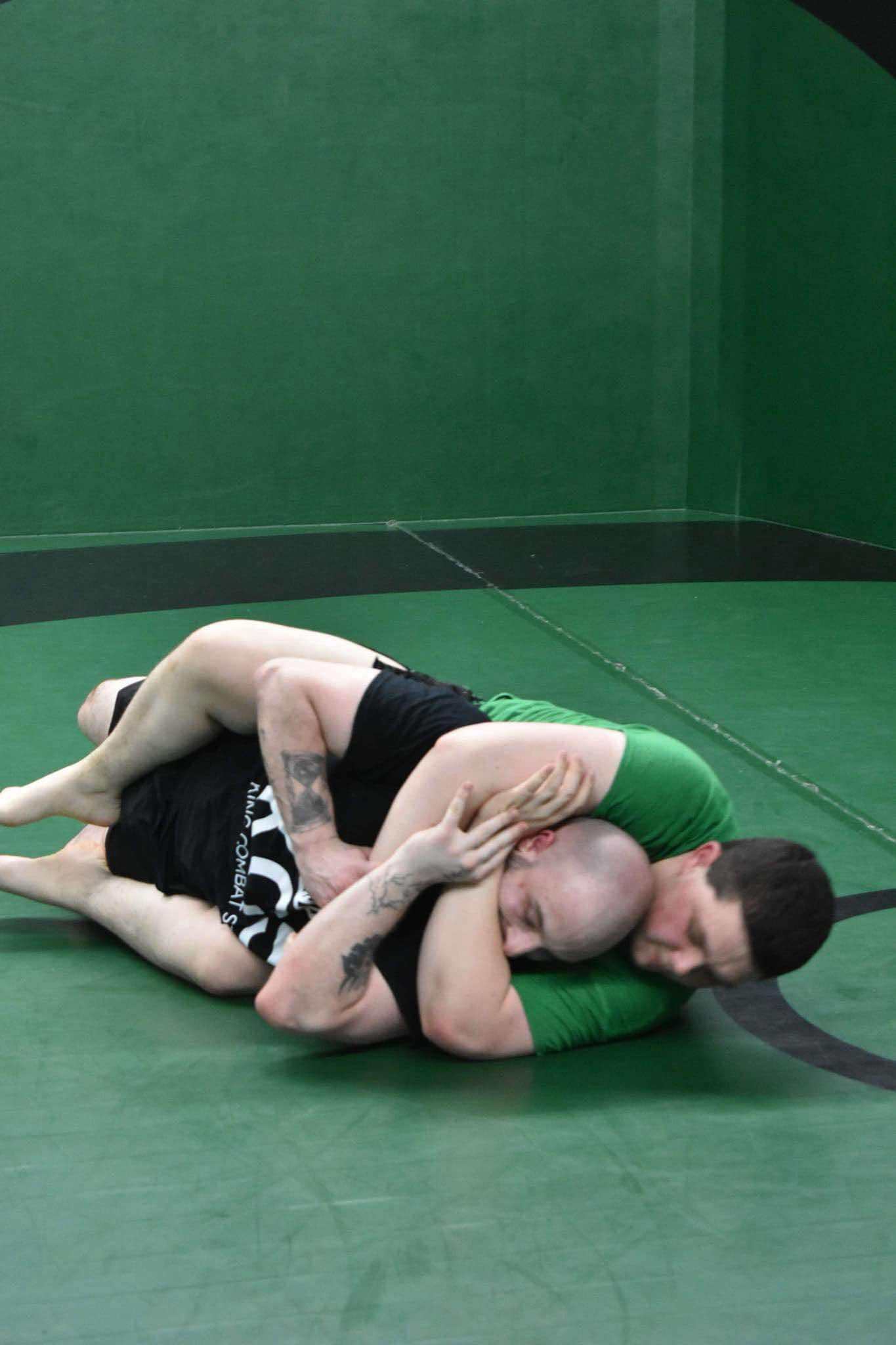 King Combat Sports students grappling on the mat